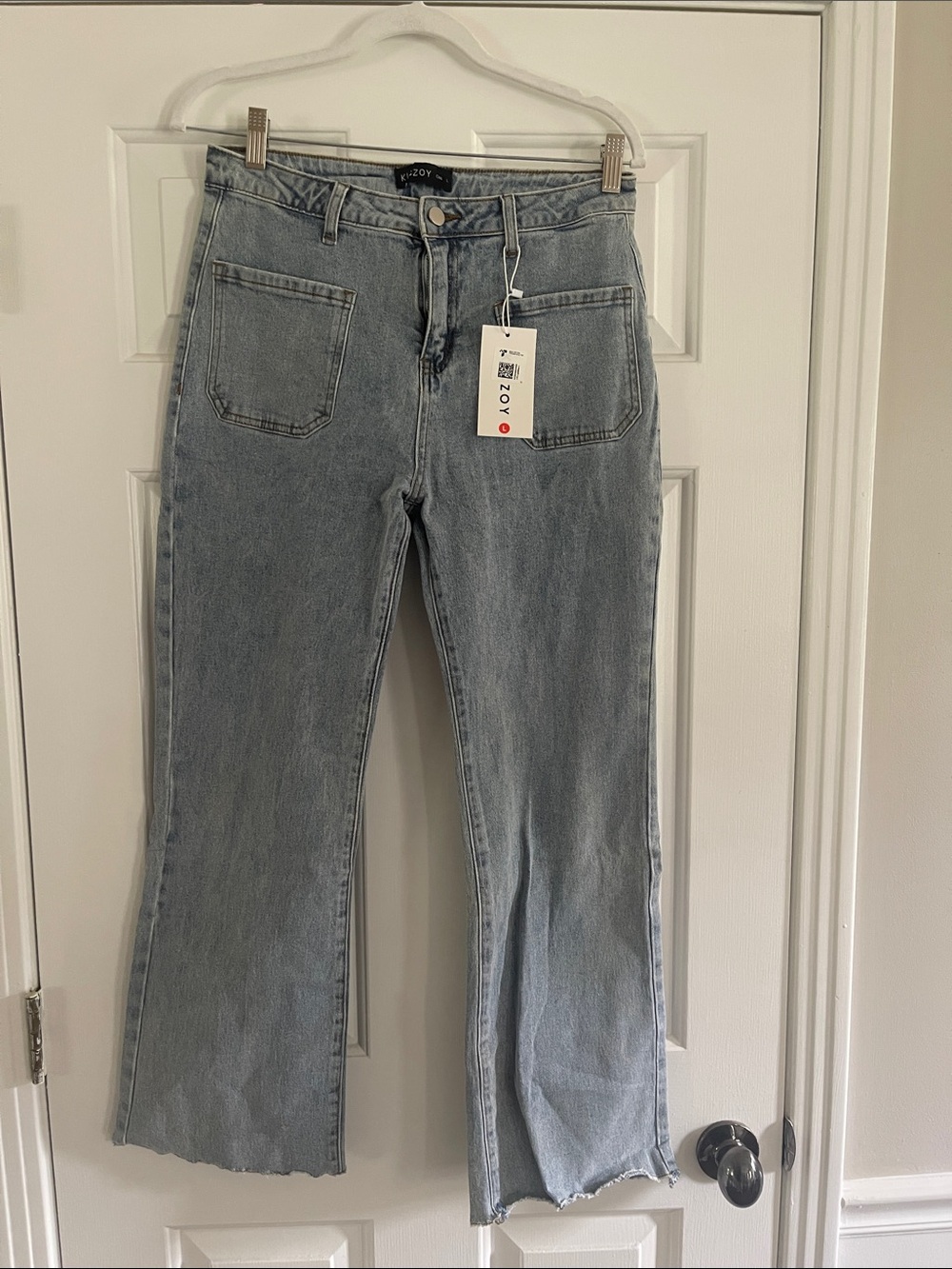 Women’s Light Blue Flare Jeans with Front Patch Pockets